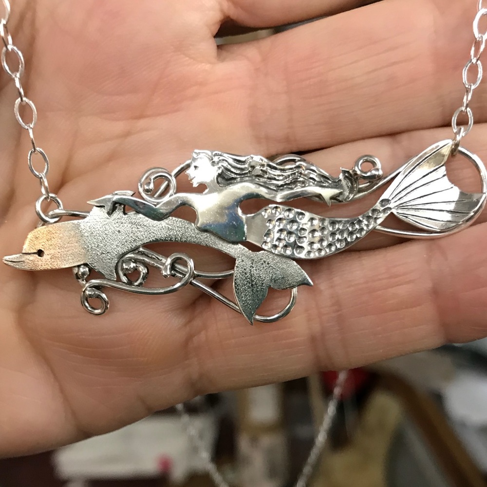 Mermaid and dolphin necklace in sterling silver